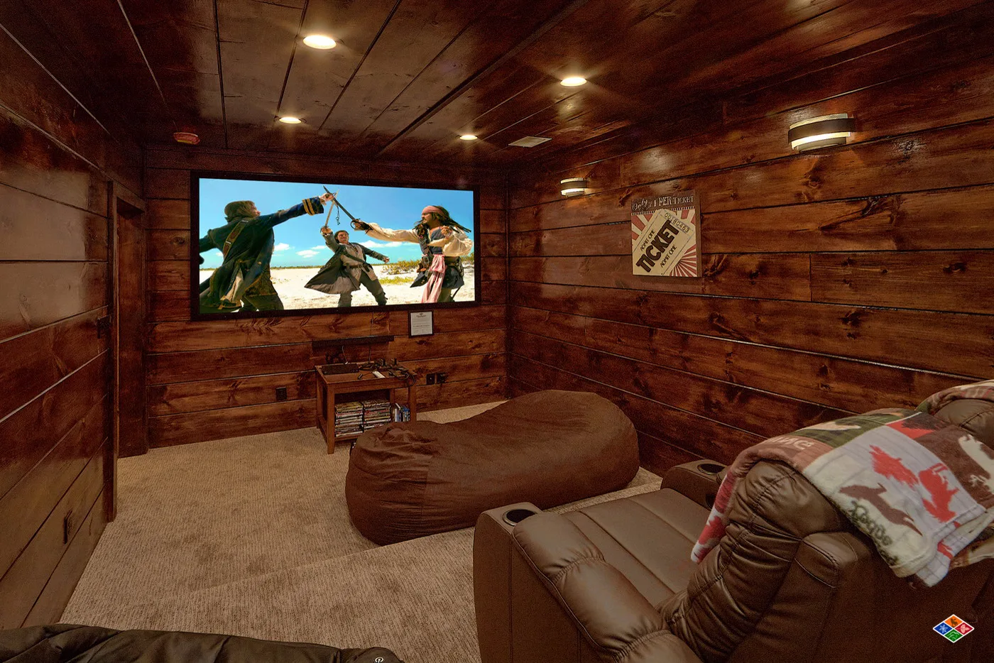 Theater room at Barrel Top Lodge with a screen and recliner