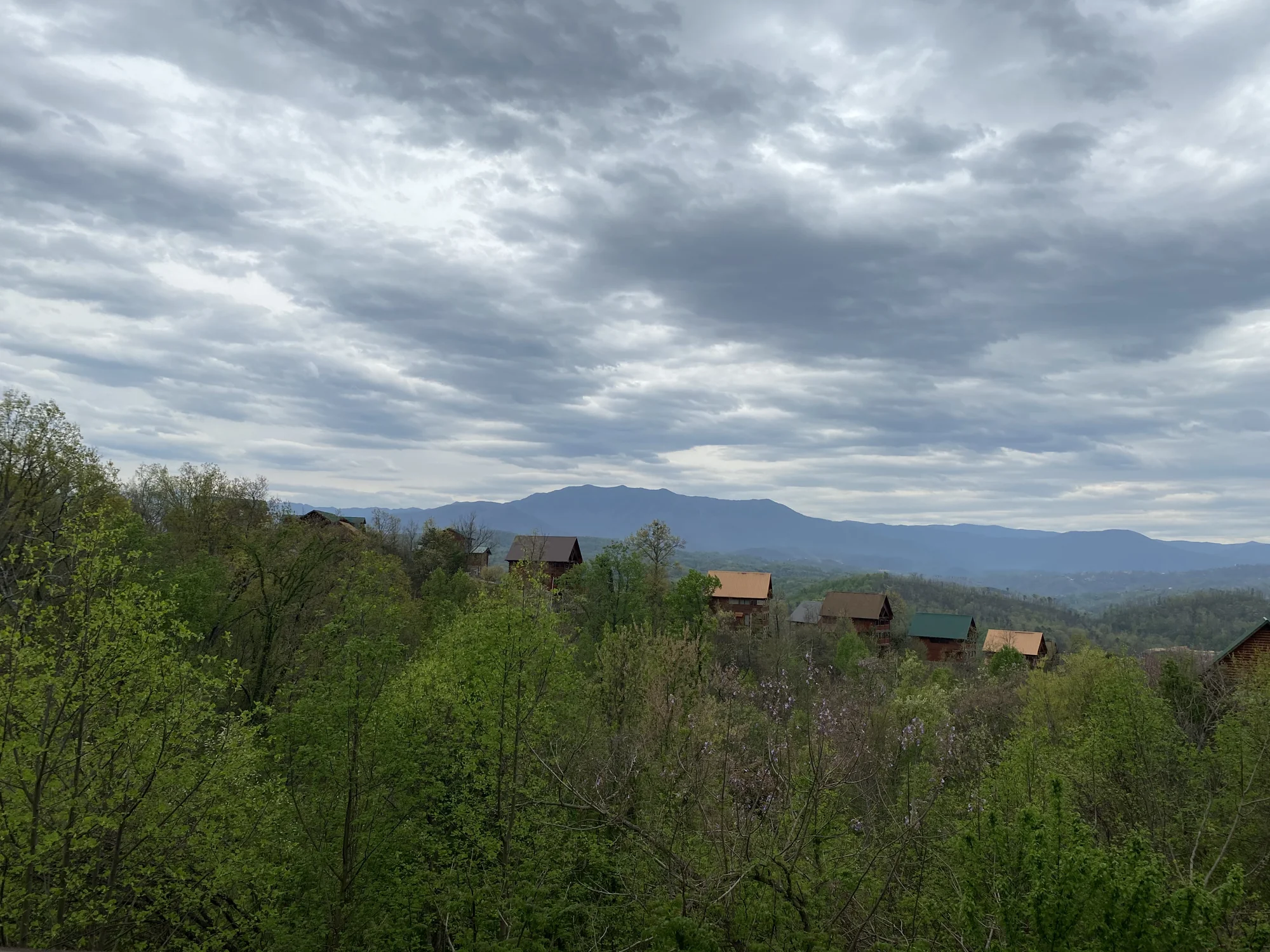 Mountain ridges and the Starr Crest cabin community from the Rocky Top Retreat deck